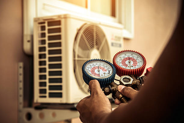 Professional Hvac technician working in Millville, DE